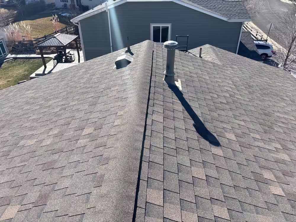 69729b09f6f289c196b45790_down-net_http20260122-289-35hrg9 (1) Residential asphalt shingle roof inspected by EcoShield in Colorado