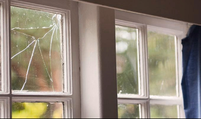 damaged window pane from hail denver colorado
