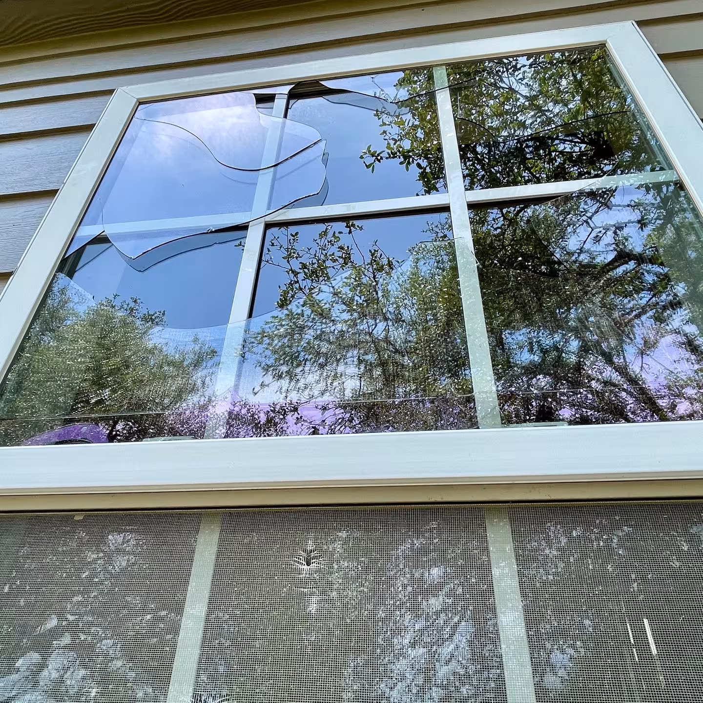ESE-window-hail-damage Hail damage to a residential window in Colorado
