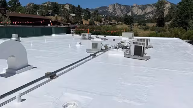 Flat roof restoration with protective coating system