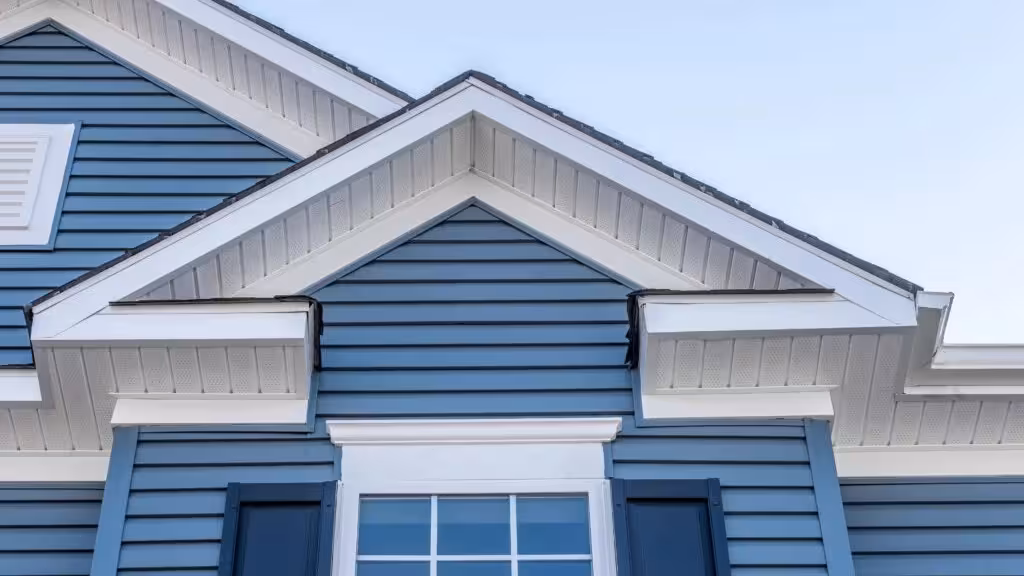 Blue vinyl siding on a Denver-area home